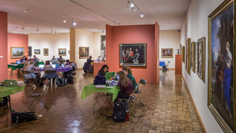 Students study in the Snite Museum of Art on the Friday study day before finals